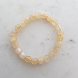 Moonstone Ball Bracelet (creamy shades. assorted. approx. 8mm beads)