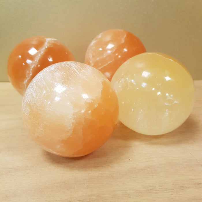 Orange Selenite Sphere (assorted. approx. 6.7-7cm diameter)