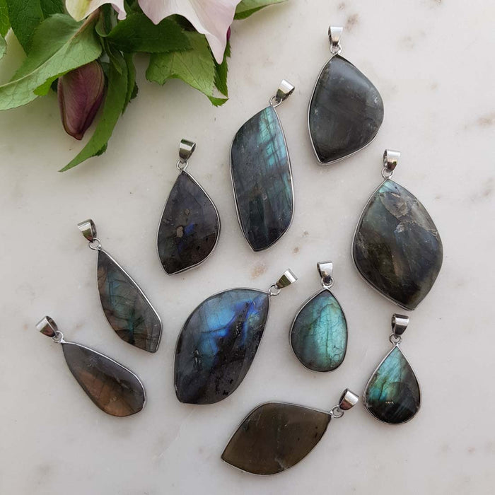 Labradorite Pendant (set in silver metal. assorted. shapes & sizes)