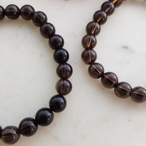 Smoky Quartz Bracelet (assorted. approx. 8mm round beads)