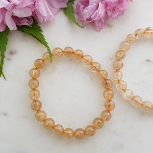 Rutilated Quartz Bracelet (assorted. approx. 8mm round beads)