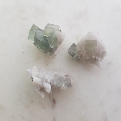 Green Cuboid Fluorite Formation on Cascading Milky Quartz over Hedenbergite Included Quartz from Mongolia (assorted. approx. 2.5-3.5x1.5-2.5cm)