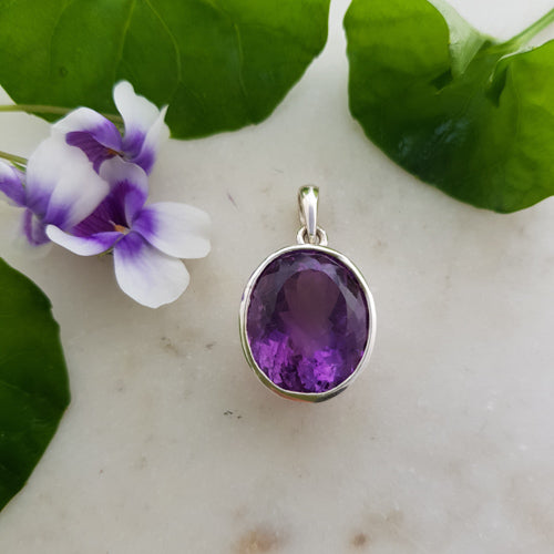 Amethyst Faceted Pendant (sterling silver filigree surround)