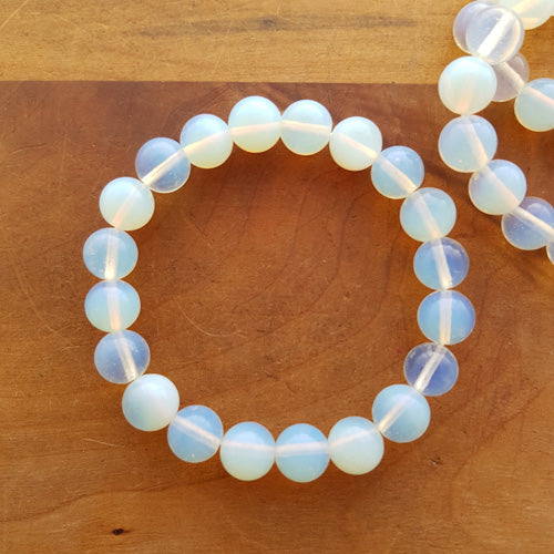 Opalite Bracelet (assorted. man made. approx. 10mm round beads)
