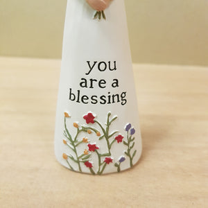 Blessing Angel Holding Flowers Figurine