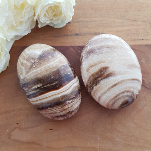 Aragonite/Calcite Palm Stone (assorted. approx. 7-8x5.5-6cm)