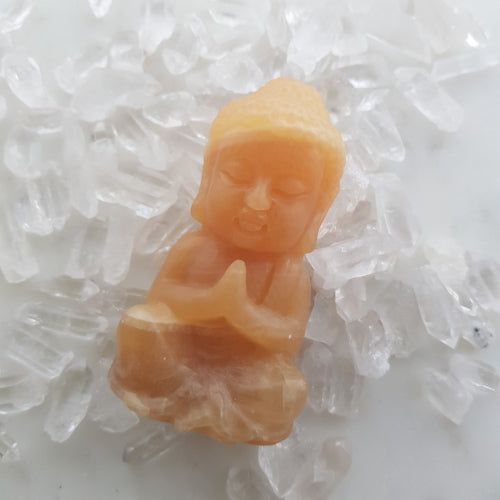 Orange Calcite Buddha (approx. 8x4x3cm)