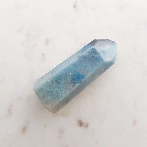 Triallite aka Trollite Point. A combination of Lithium, Lepidolite, Blue Tourmaline and Lazulite (approx. 7.9x3.1cm)