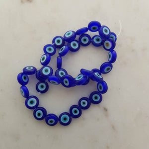 Blue Eye Flat Glass Beads in Reusable Plastic Box (string of approx. 36 flat 10mm beads)