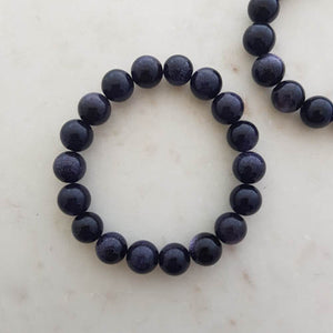 Blue Sandstone Bracelet (man-made. assorted. approx. 10mm round beads)