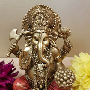 Gold and Red Ganesh Statue