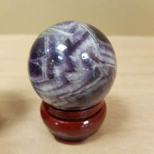 Chevron Amethyst Sphere with Wooden Stand (assorted. approx. 4.7cm diameter)