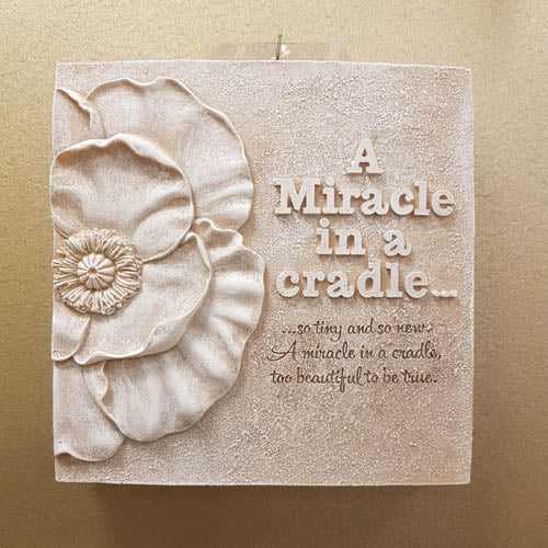 A Miracle In A Cradle Plaque ( approx 16x16x2.5cm)