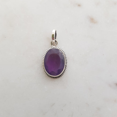 Amethyst Pendant (faceted. sterling silver)