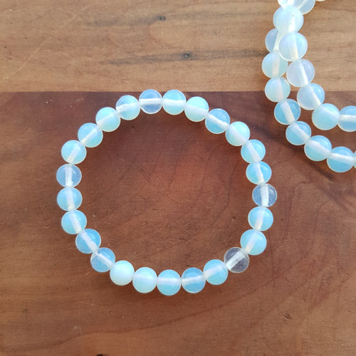 Opalite Bracelet (assorted. man made. approx. 8mm round beads)