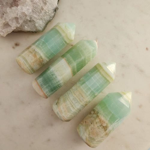 Pistachio Calcite Point (assorted. approx. 7.3-9x2.8-3.1x2.5cm)