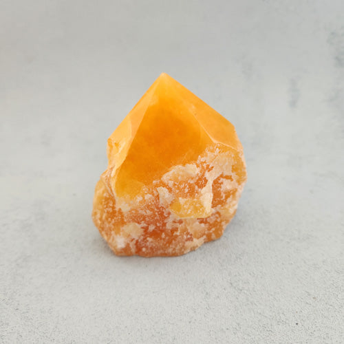 Orange Calcite Partially Polished Point (approx. 7.9x7.1x5.5cm)