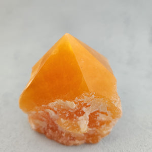 Orange Calcite Partially Polished Point