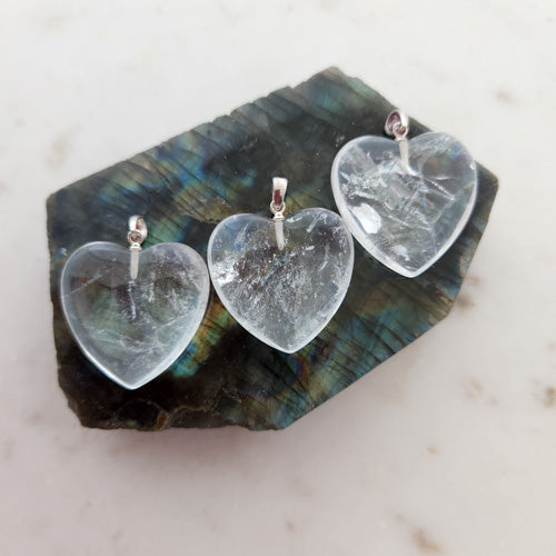 Clear Quartz Heart Pendant (assorted. 2.5cm. sterling silver bale)