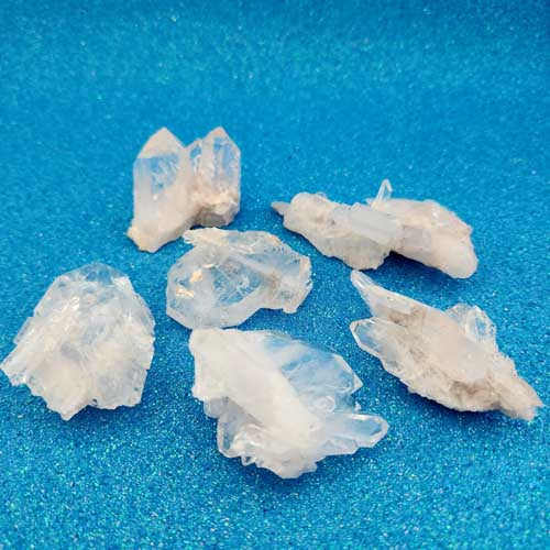Faden Lithium incl. Quartz Cluster from Colombia (assorted. approx. 1.5-3.6x3.2-4.4x4.5-8.2cm)