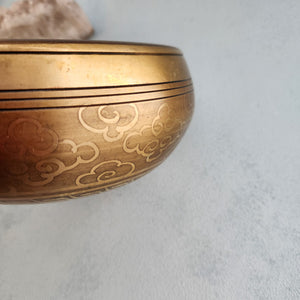 Singing Bowl with Tibetan Symbols Engraved in the Bowl