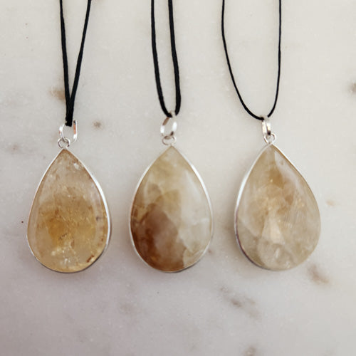 Citrine Tear Drop Pendant (heat treated. assorted. silver metal).