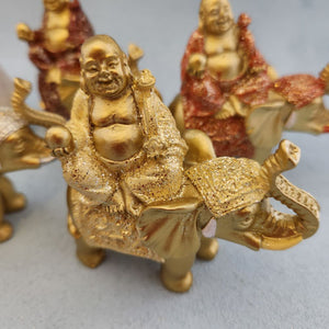 Buddha Sitting on Glitter Elephant