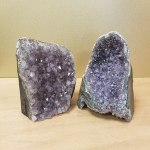 Large standing Amethyst clusters with small purple points and natural shimmer.