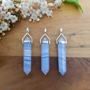 Blue Lace Agate point pendant set in sterling silver with soft blue and white banding
