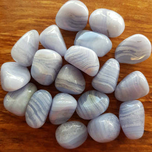 Blue Lace Agate tumbled stone with pale blue and white banding