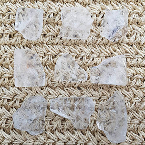 Polished clear quartz slab with pale translucency and smooth flat shape.