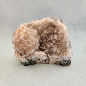 Pink Amethyst flower cluster with soft blush tones and petal-like form.