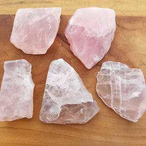 Soft pink polished rose quartz slab with smooth flat shape.